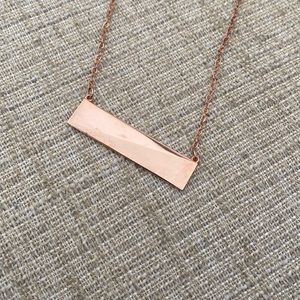 14k rose gold plated brass bar necklace.